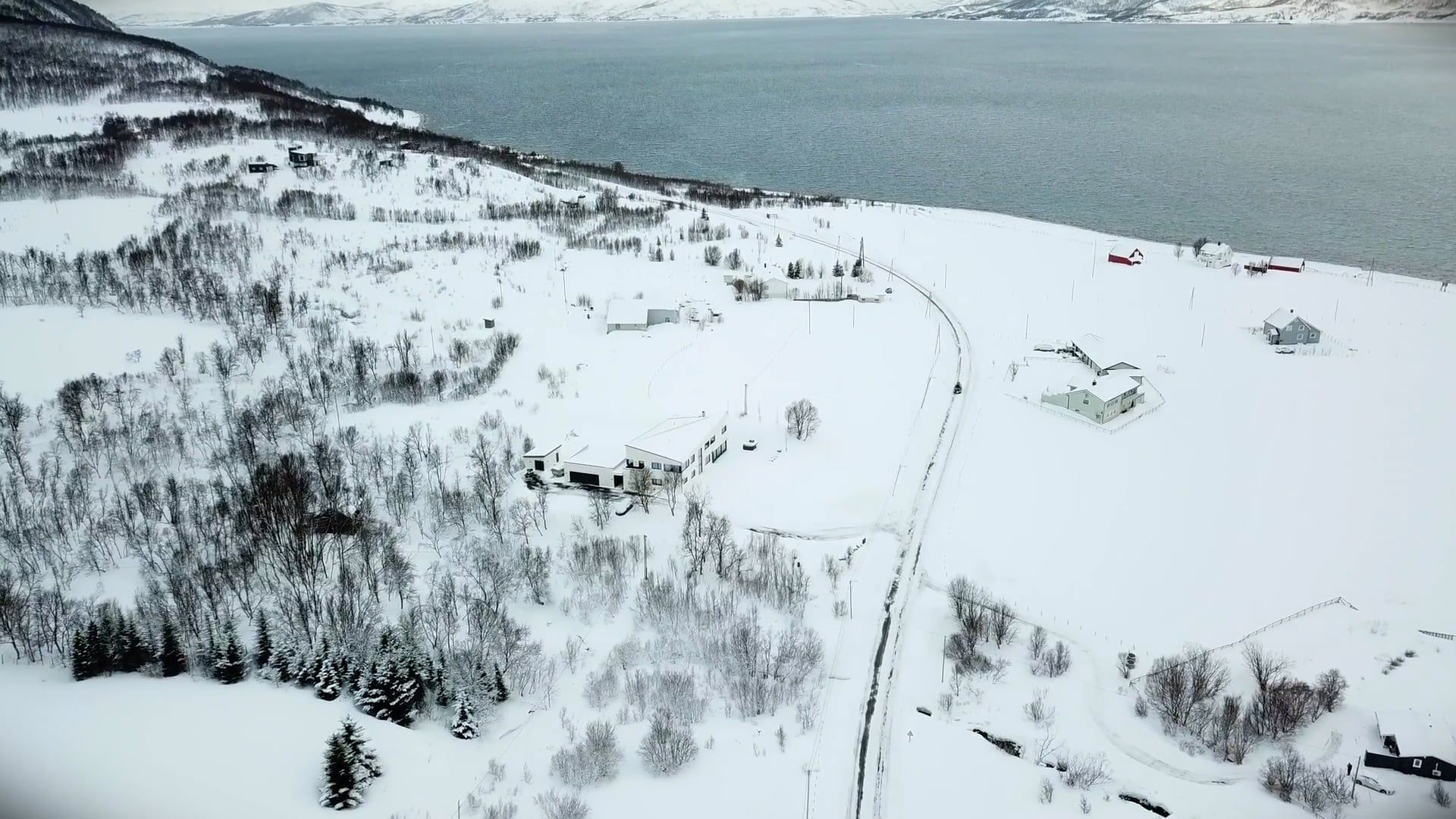Aerial Footage of a Snow Covered Town by the Sea Free Stock Video ...