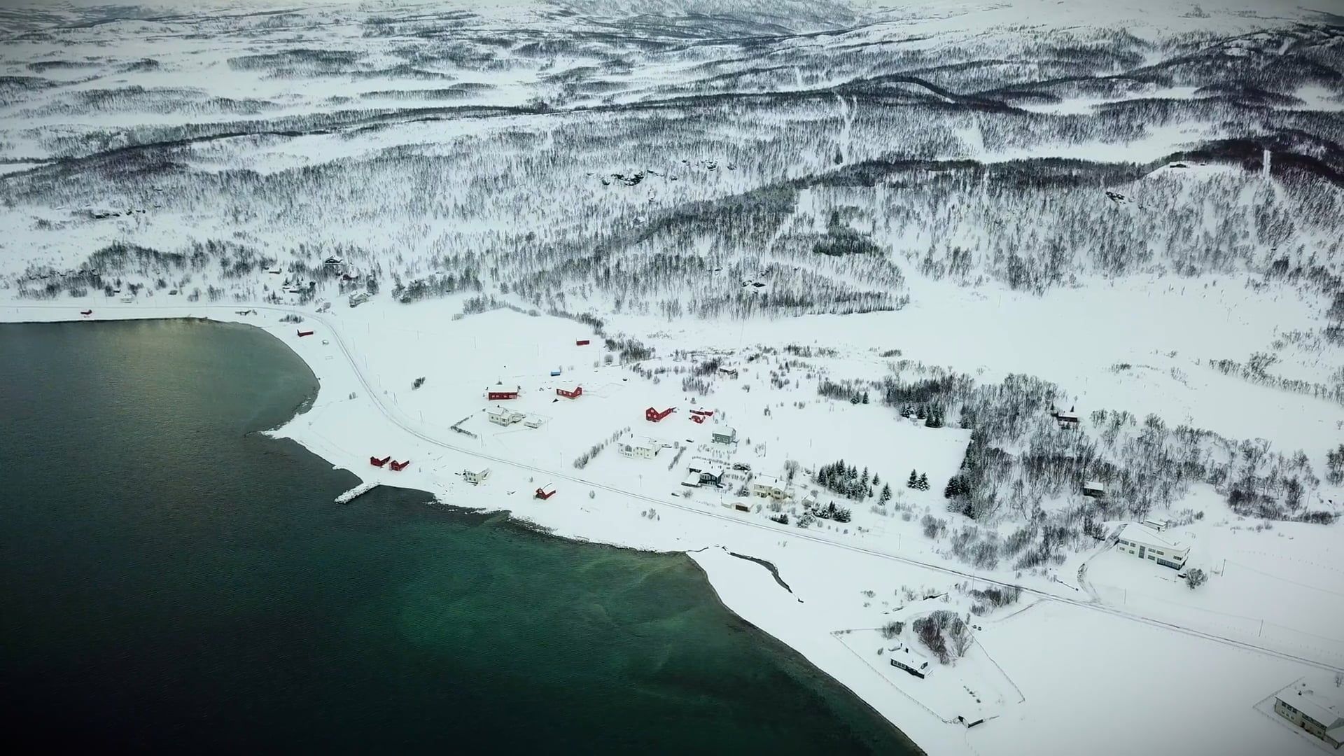 Aerial Footage of a Snowy Coastal Village Free Stock Video Footage ...