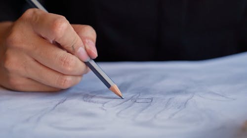 Close Up Footage of a Person Drawing with a Pencil