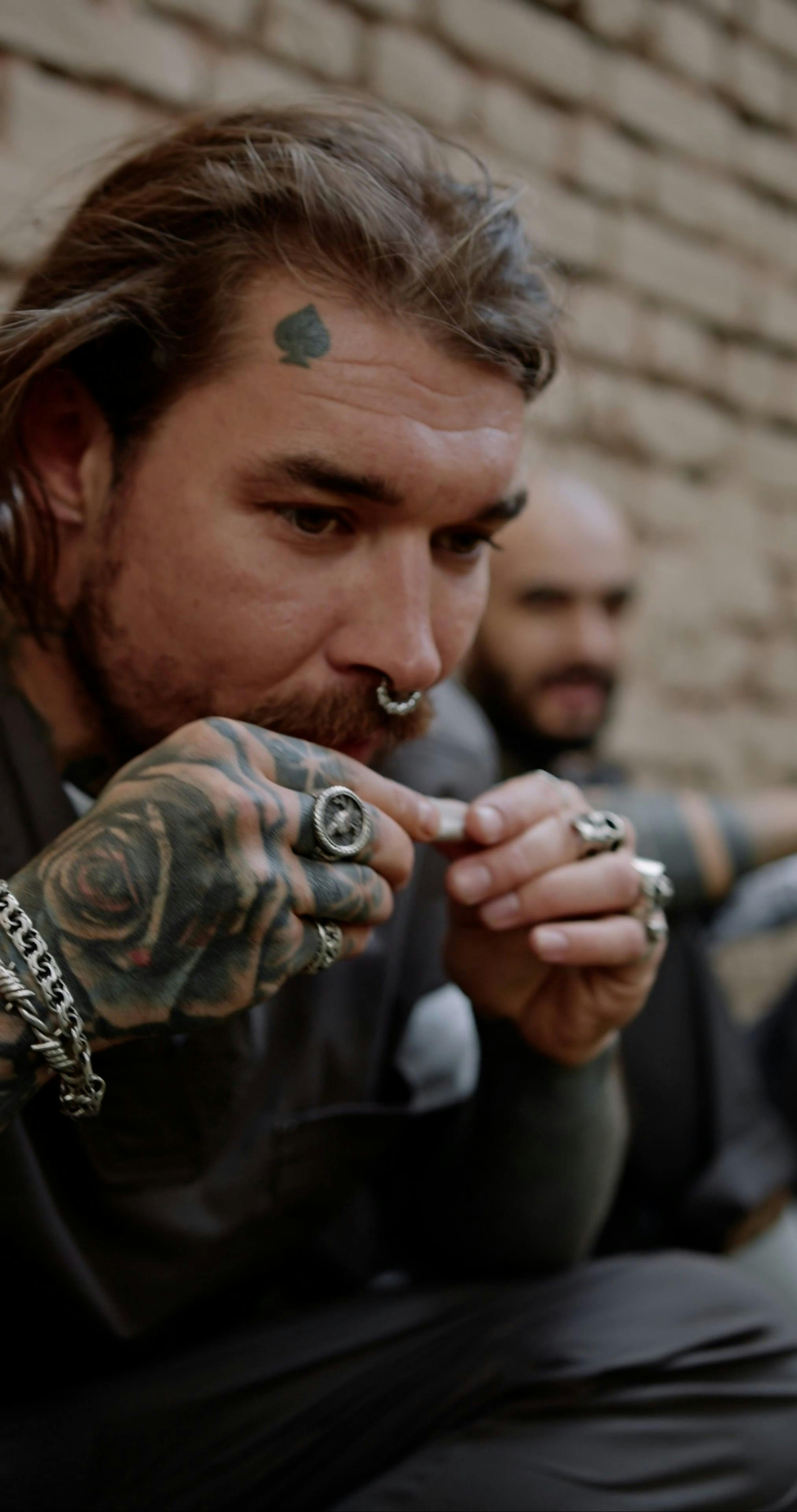 Men in Prison Uniforms Smoking Cigarettes Free Stock Video Footage, RoyaltyFree 4K & HD Video Clip