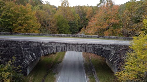 Cars Passing by the Bridge and the Roads