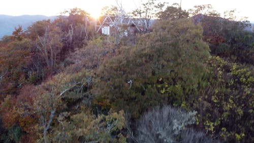 Drone Footage of a Lookout Tower in Mountain Landscape