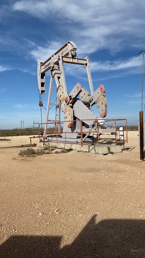 Crane Working on Oil Plant