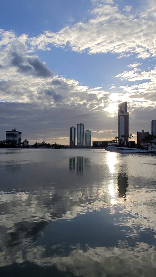 Sunlight over City by Lake