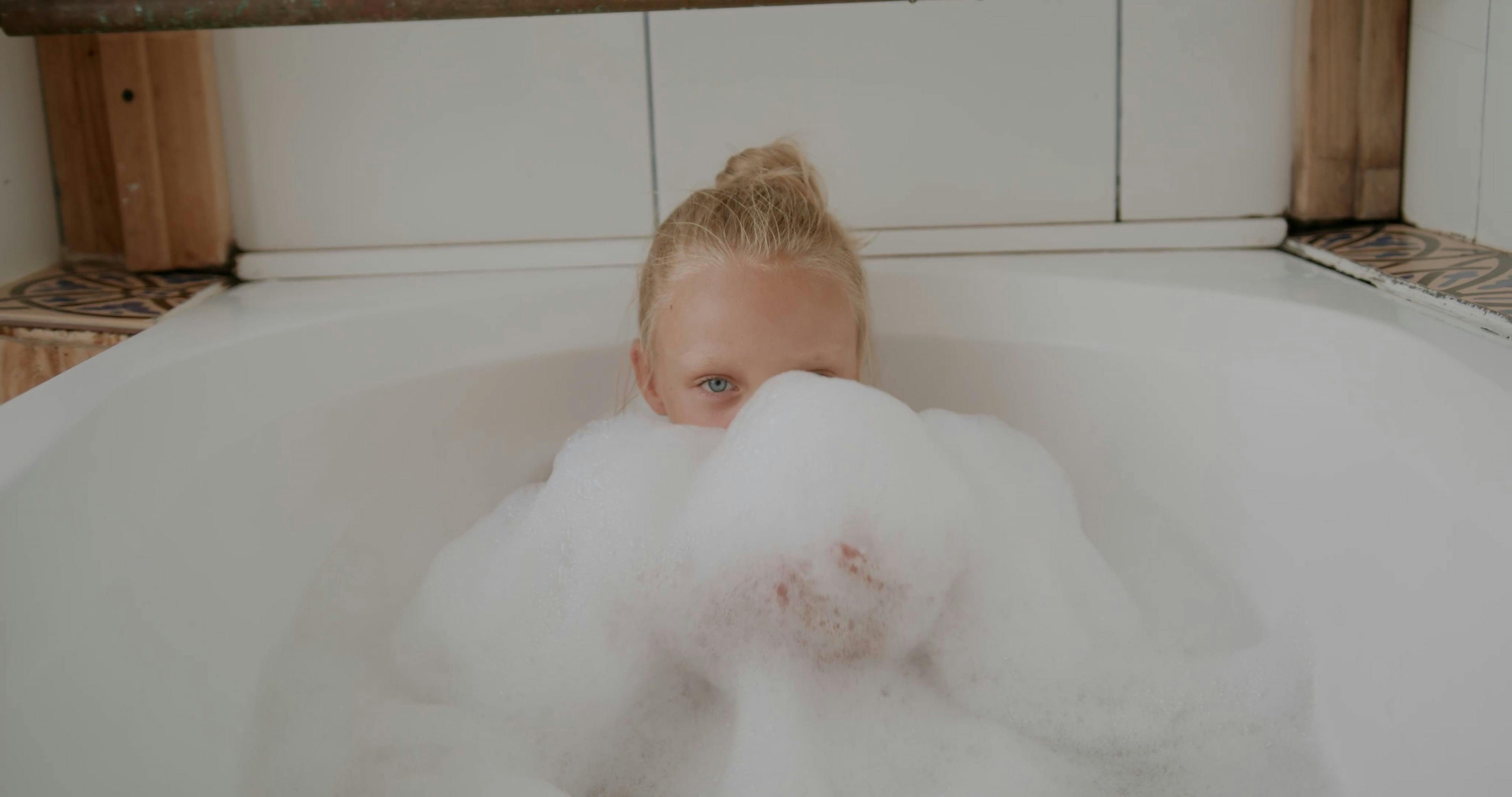 A Girl Playing Bubble Soap on a Bathtub Free Stock Video Footage,  Royalty-Free 4K & HD Video Clip