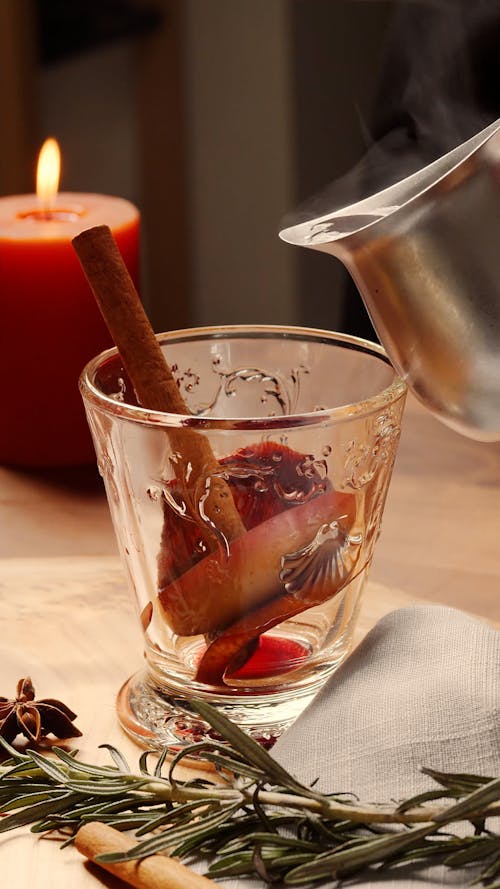 Pouring Mulled Wine to Glass