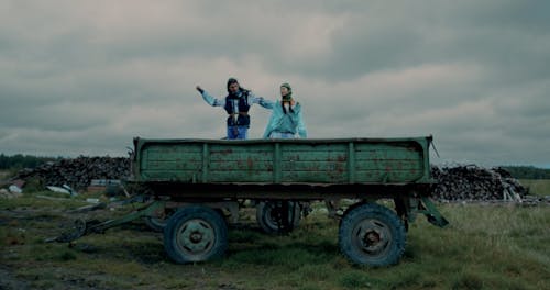 Hippie Couple Together on Trailer