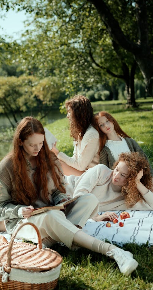 Women Reading Books at a Picnic