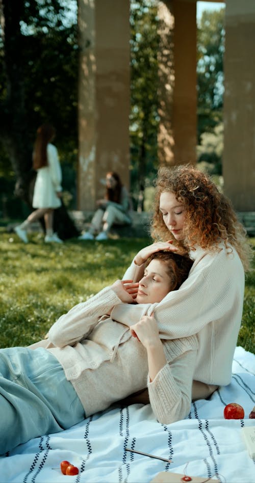 Young Women Having a Picnic at a Park