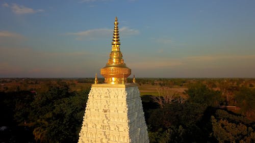 Buddhist Temple Towering Over Rural Area