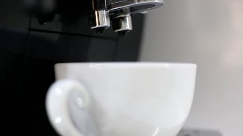 Close up of a Cup in an Espresso Machine