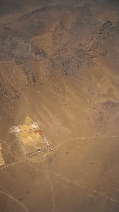 Aerial View of a City in a Desert Landscape