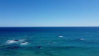 blue sky over blue sea