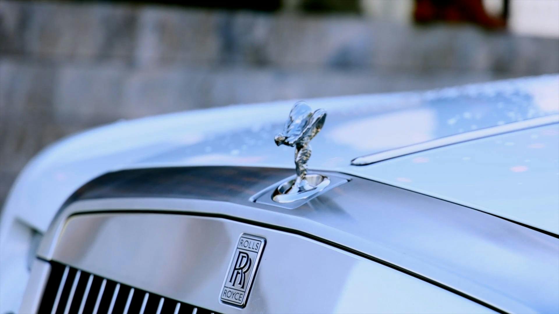 Close up on Rolls Royce Car Sign · Free Stock Video