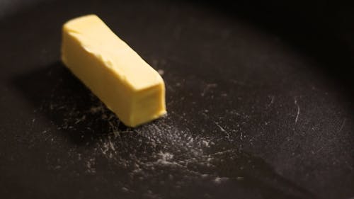 Close up on Melting Butter on Pan