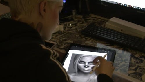 Person Drawing On Ipad