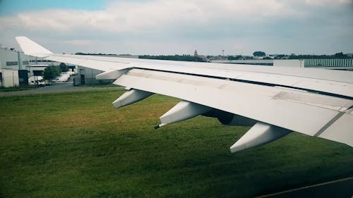Window Seat View of an Airplane Taking Off 
