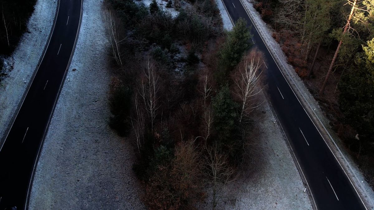 Serene Aerial View of Foggy Mountain Road Free Stock Video Footage ...