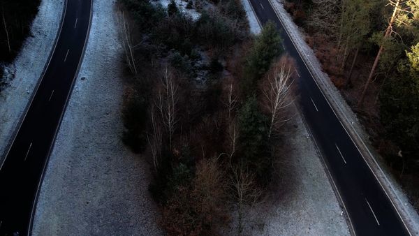 Serene Aerial View of Foggy Mountain Road Free Stock Video Footage ...