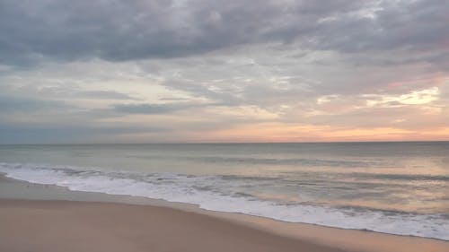 Romantic Sky at Sunset over Tranquil Sea