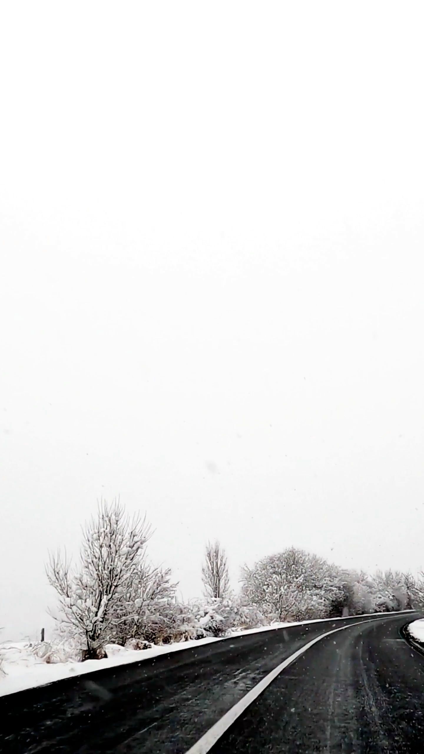 car driving along road in winter 11007491