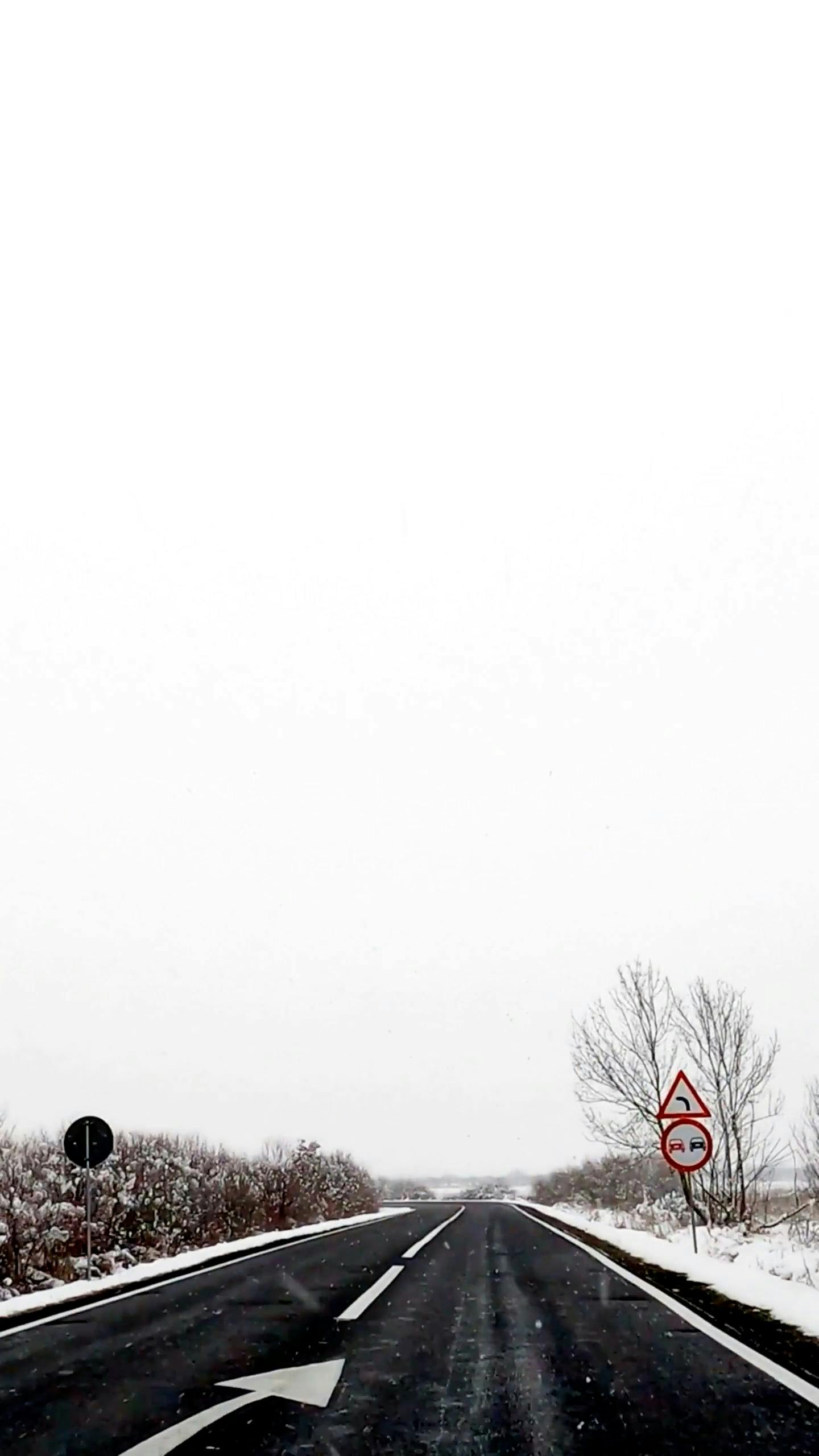 car moving along road in winter 11007610