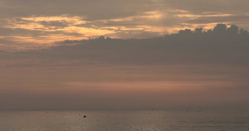 Time Lapse of Sunset Above Sea