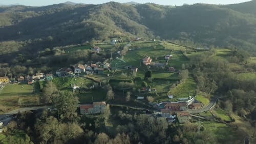 Drone Footage of a Small Town in a Mountain Landscape