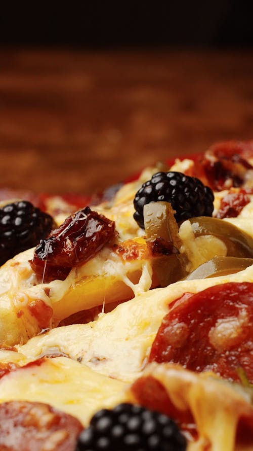Close-up of Pizza Slice with Fruit
