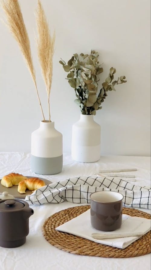 Plants, Croissants and Cup on Table