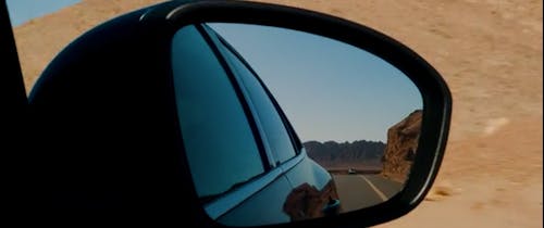 Road Seen in Car Mirror 