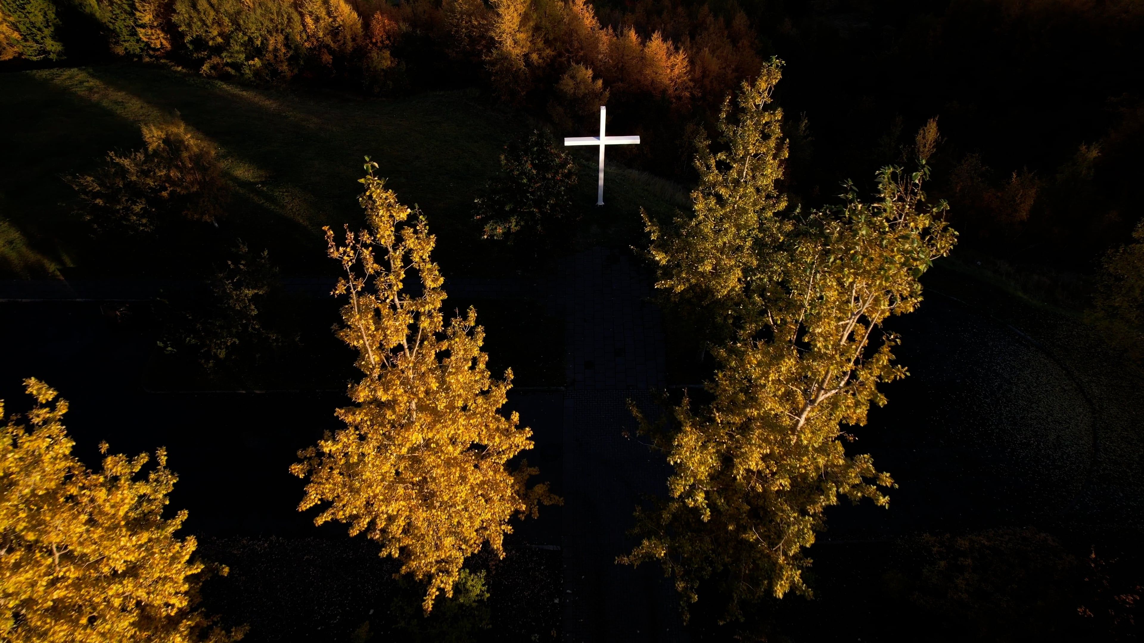 Drone Footage of a White Cross in a Park Free Stock Video Footage ...