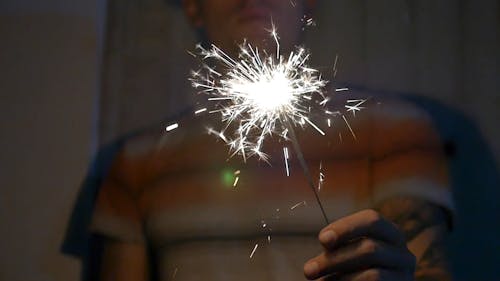 Man Playing with Sparklers