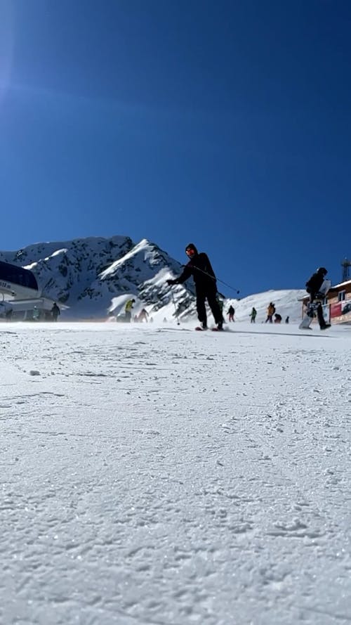 Skier Skiing towards Camera