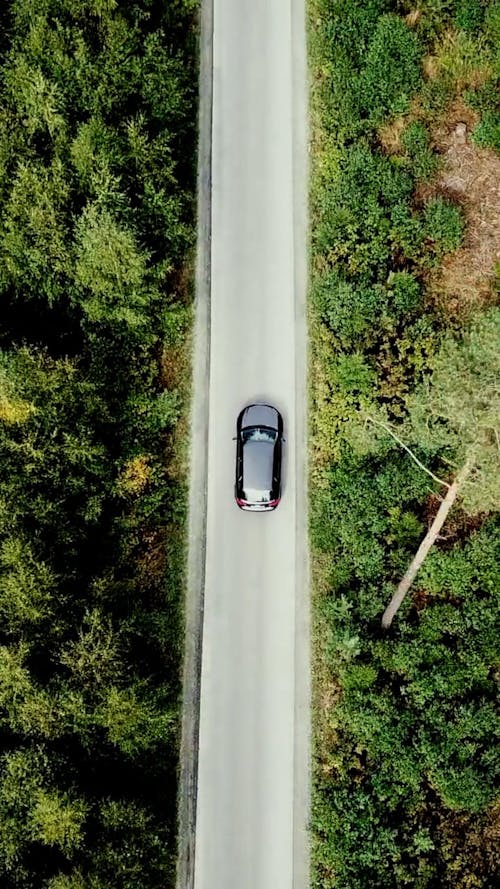 Drone Footage of a Car Travel on the Road