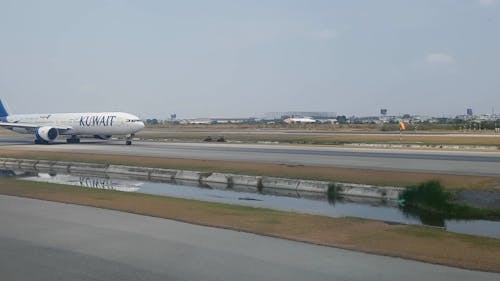 Kuwait Airways Airplane Taxiing on the Runway 