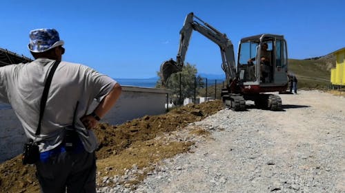 Man Driving Excavator