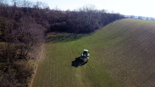 Aerial View of Tractor on Agricultural Field