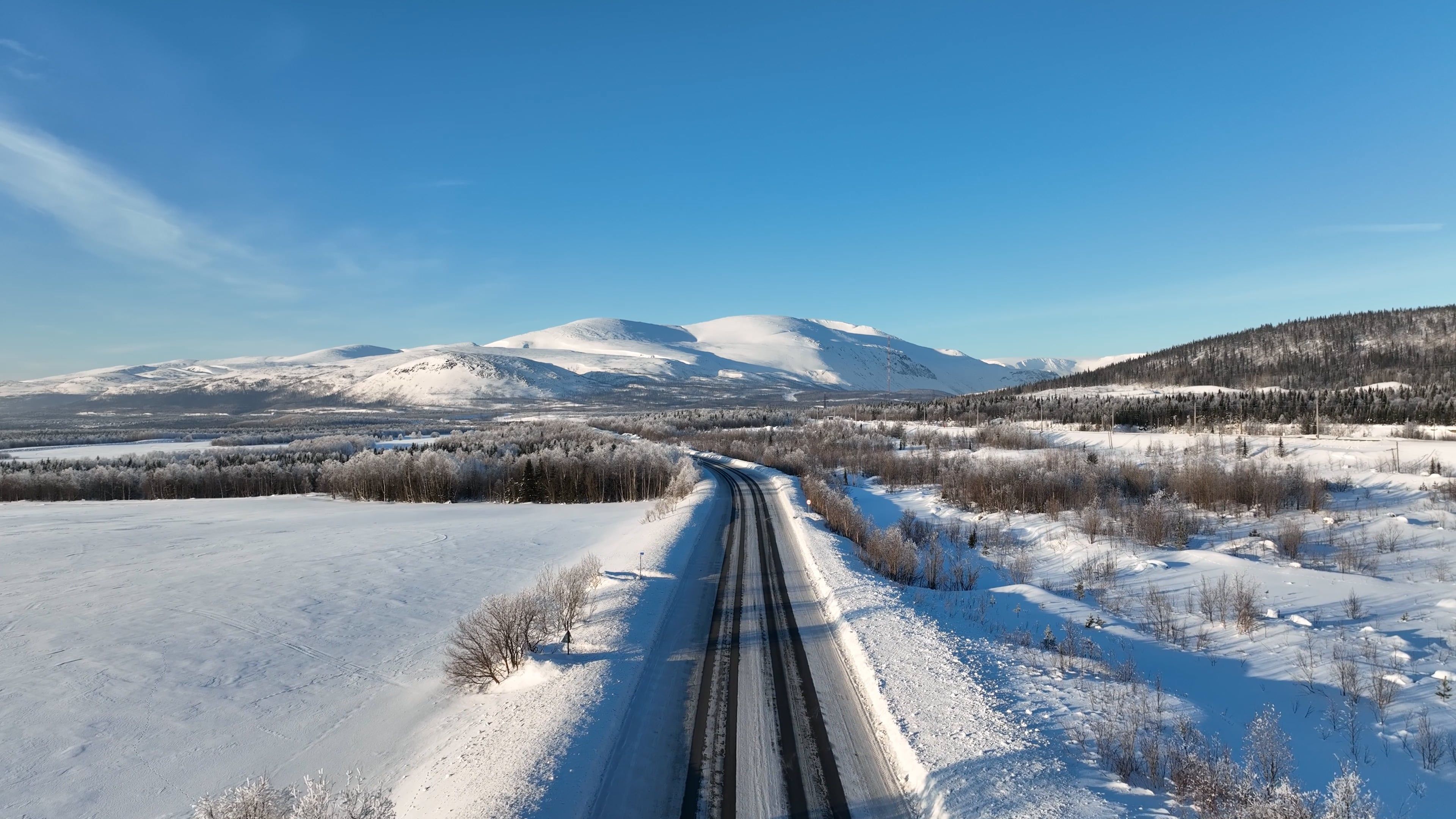Drone Footage of a Road in a Winter Landscape Free Stock Video Footage ...