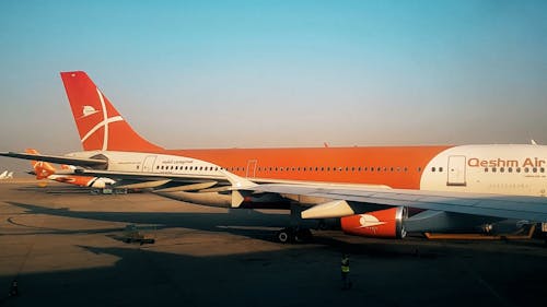 View from a Plane Window while Taxiing on the Runway 