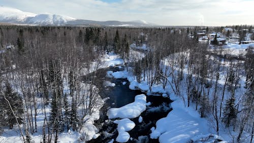 Drone Footage of a River in a Winter Landscape 