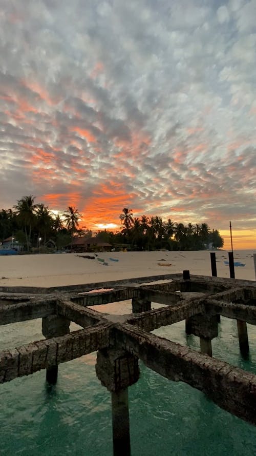 Sunset under Clouds over Beach