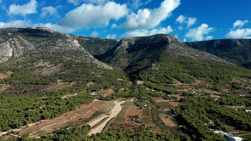 Drone Video of Brac Island Farm Fields and Mountains 