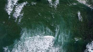 sea waves breaking on beach