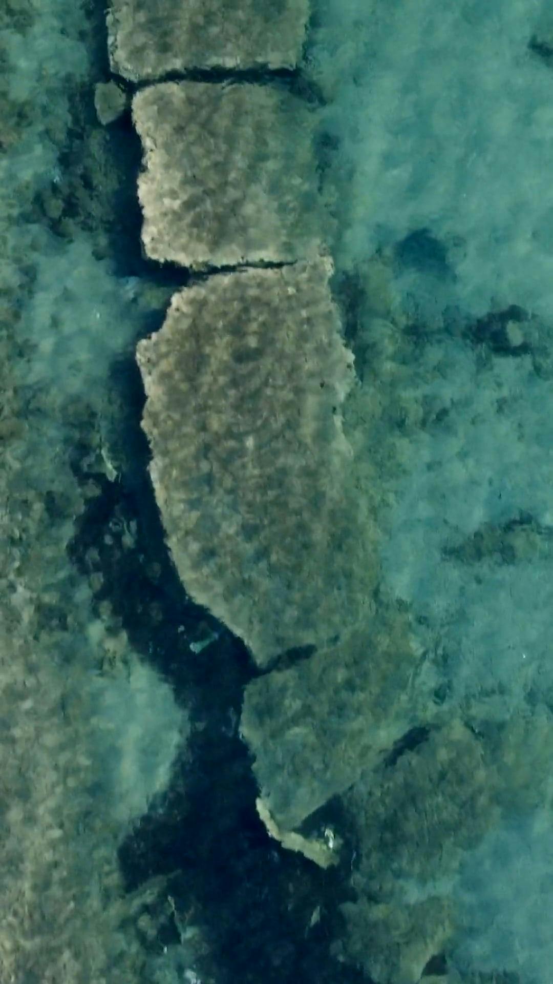 Top View of Rocks under Crystalline Turquoise Water · Free Stock Video