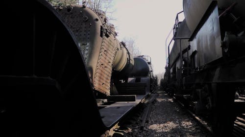 Rusty Old Train Wagons on Railroad Tracks