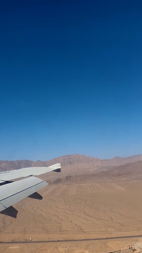 Window View of an Airplane Landing
