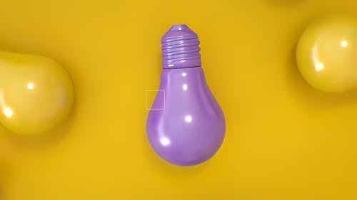 Purple bulb amongst Yellow bulbs on yellow background. leadership unique idea concept