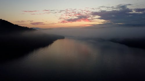 Drone Footage of a River on a Foggy Morning 