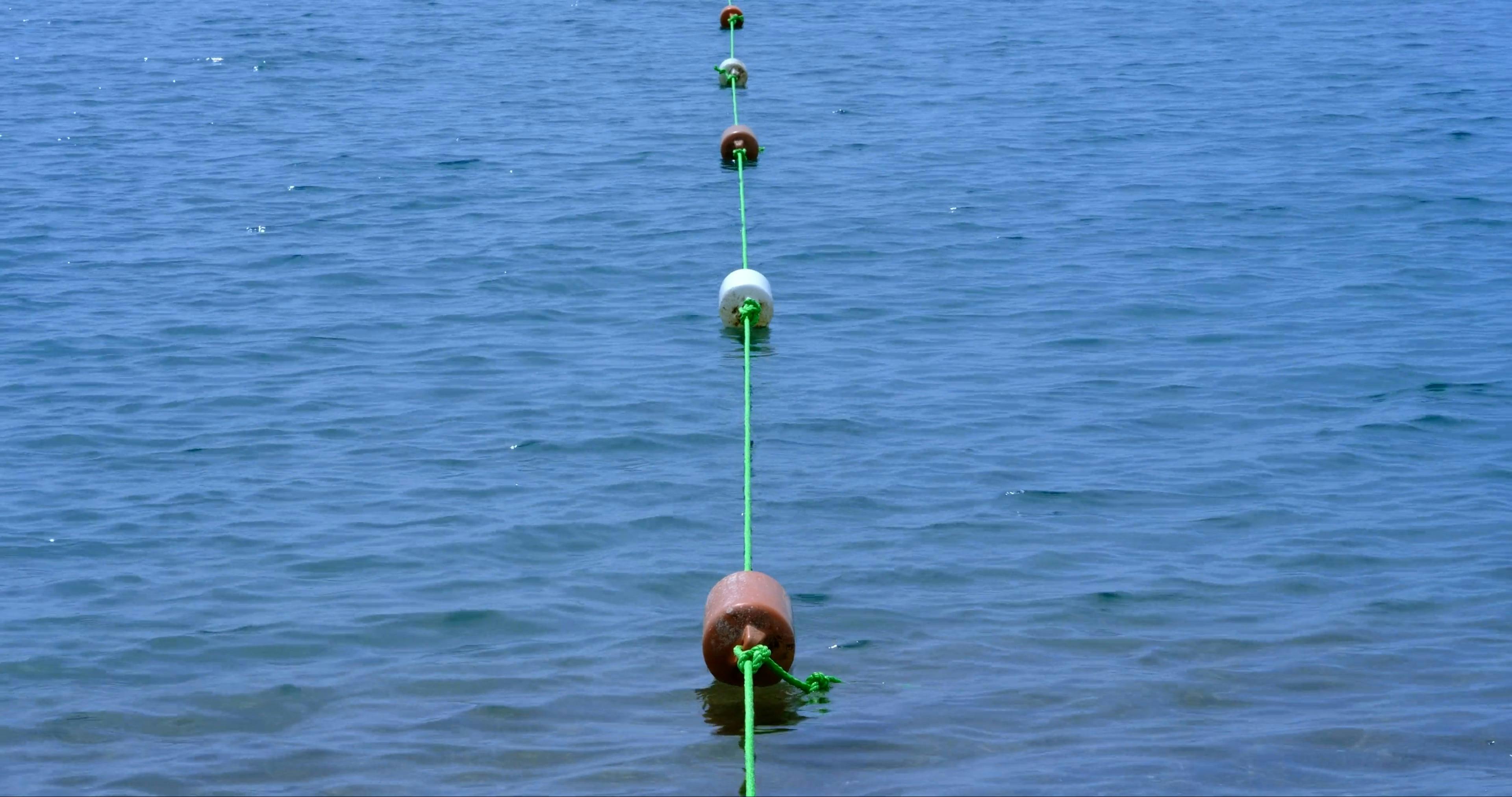 A String Of Buoys Floating In The Sea Free Stock Video Footage, Royalty ...